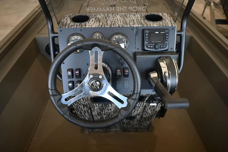 Slide: The Image of Steering console of 2025 Thor Lake Hammer 1900CC boat with modern controls. - 8