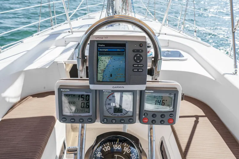 Slide: The Image of Cockpit of 1992 Morgan 45 Catalina sailboat with navigation instruments and GPS display. - 31
