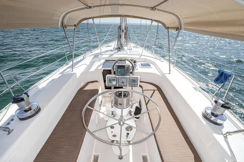 Slide: The Image of Luxurious interior of a 1992 Morgan 45 Catalina yacht with modern kitchen and seating. - 4