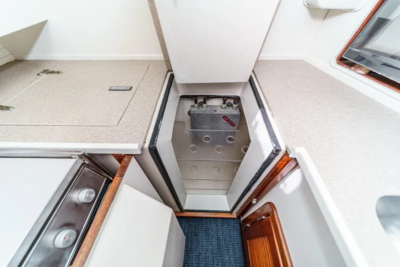 Slide: The Image of Interior view of 1992 Morgan 45 Catalina yacht, featuring a storage compartment. - 40