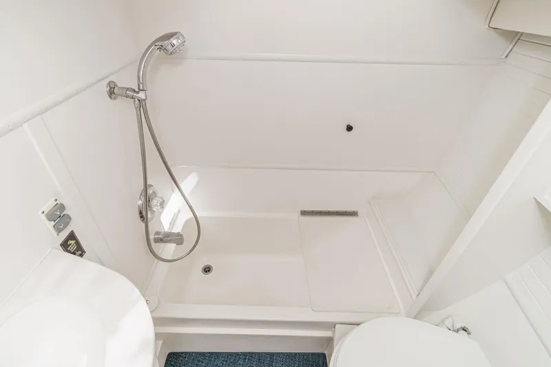 Slide: The Image of Bathroom interior of 1992 Morgan 45 Catalina yacht with shower and toilet. - 54