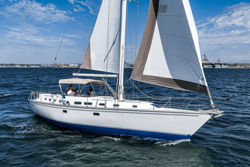 Slide: The Image of Luxurious 1992 Morgan 45 Catalina yacht kitchen with wooden cabinets and modern amenities. - 6