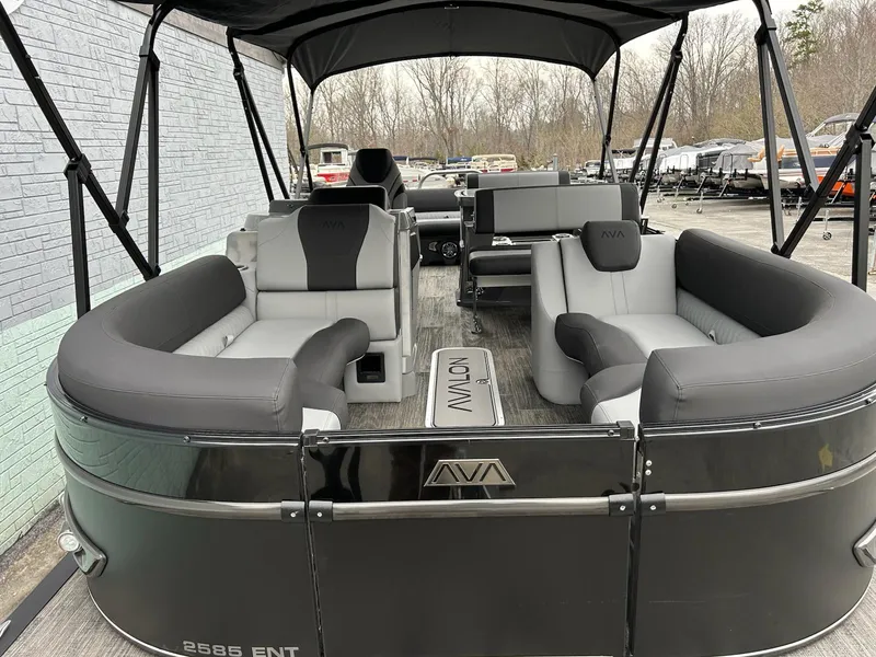 Slide: The Image of 2025 Avalon 2585 Catalina Entertainer boat interior with gray seating and modern design. - 5
