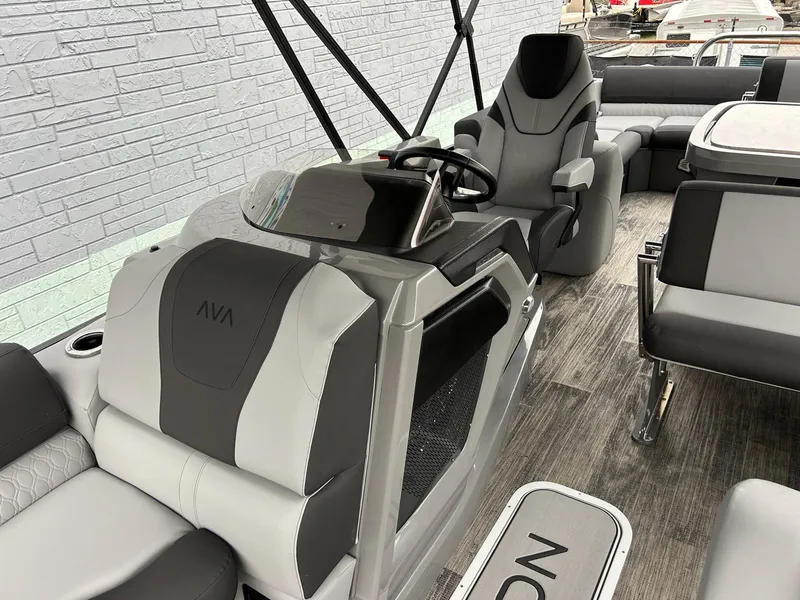 Slide: The Image of 2025 Avalon 2585 Catalina Entertainer boat interior with modern helm and seating. - 8