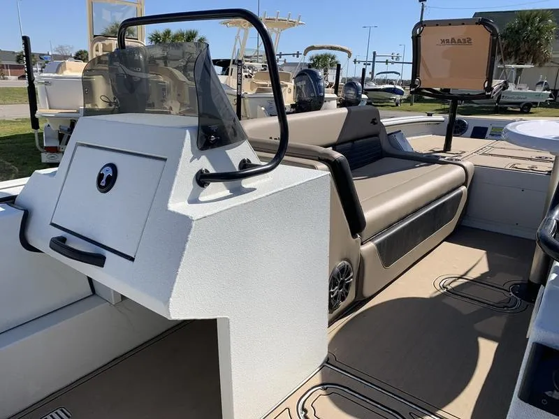 Slide: The Image of 2025 SeaArk Easy 200 boat interior with seating and console, showcasing modern design and functionality. - 18