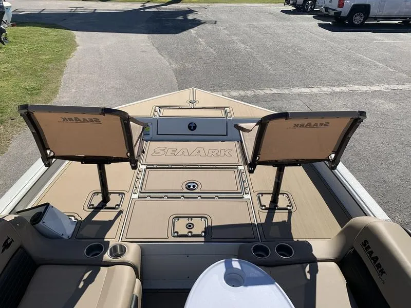 Slide: The Image of 2025 SeaArk Easy 200 boat interior with seating and storage compartments. - 23
