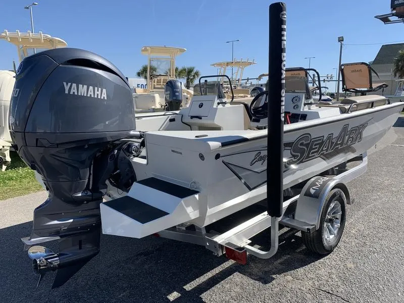 Slide: The Image of 2025 SeaArk Easy 200 boat with Yamaha outboard motor, parked on a trailer. - 3