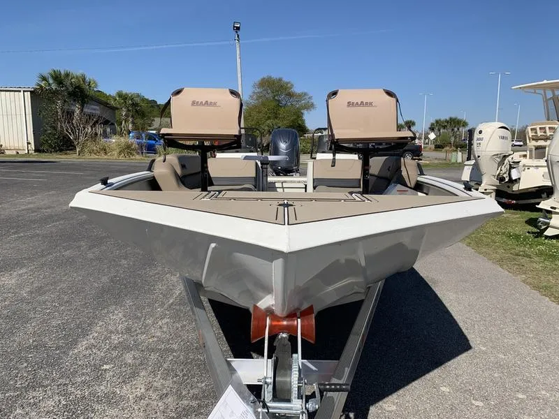 Slide: The Image of 2025 SeaArk Easy 200 boat on trailer, featuring dual seats and outboard motor. - 6