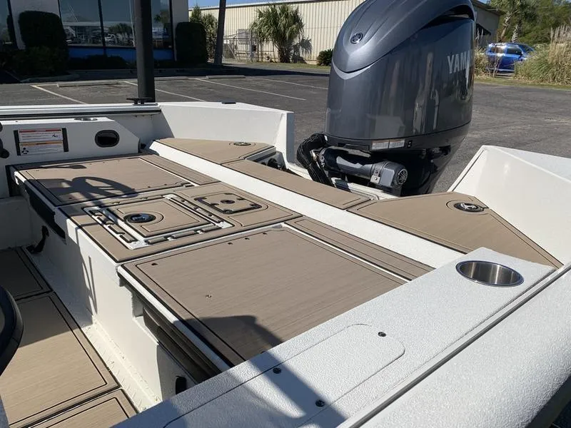 Slide: The Image of 2025 SeaArk Easy 200 boat interior with Yamaha outboard motor, featuring spacious deck layout. - 9