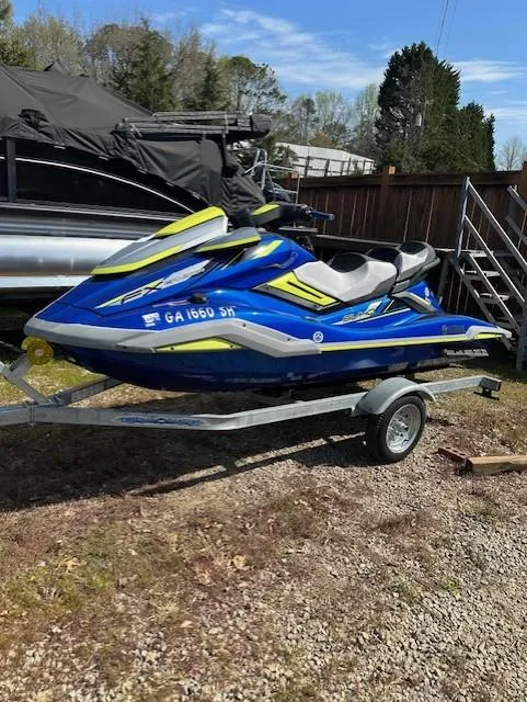 Slide: The Image of 2020 Yamaha WaveRunner FX Cruiser SVHO on trailer, parked outdoors. - 1