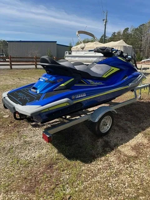Slide: The Image of 2020 Yamaha WaveRunner FX Cruiser SVHO on trailer, parked outdoors. - 2