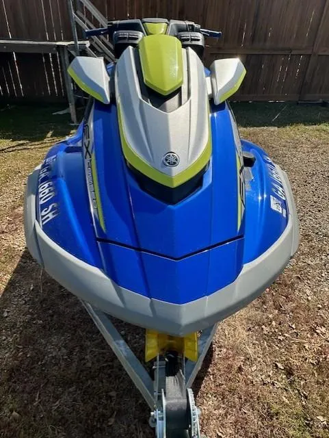Slide: The Image of 2020 Yamaha WaveRunner FX Cruiser SVHO in blue and green on a trailer. - 6