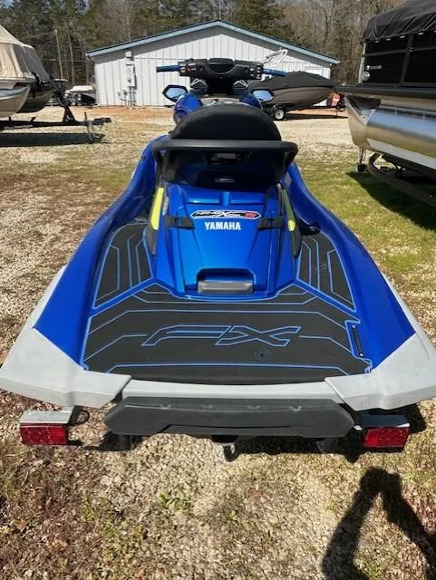 Slide: The Image of 2020 Yamaha WaveRunner FX Cruiser SVHO, blue, parked outdoors on gravel. - 7