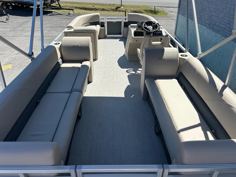 Slide: The Image of 2025 Avalon 2380 VLS Quad Lounger pontoon boat with spacious seating and modern design. - 11
