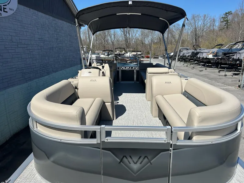 Slide: The Image of 2025 Avalon 2380 VLS Quad Lounger pontoon boat with spacious seating and canopy. - 4
