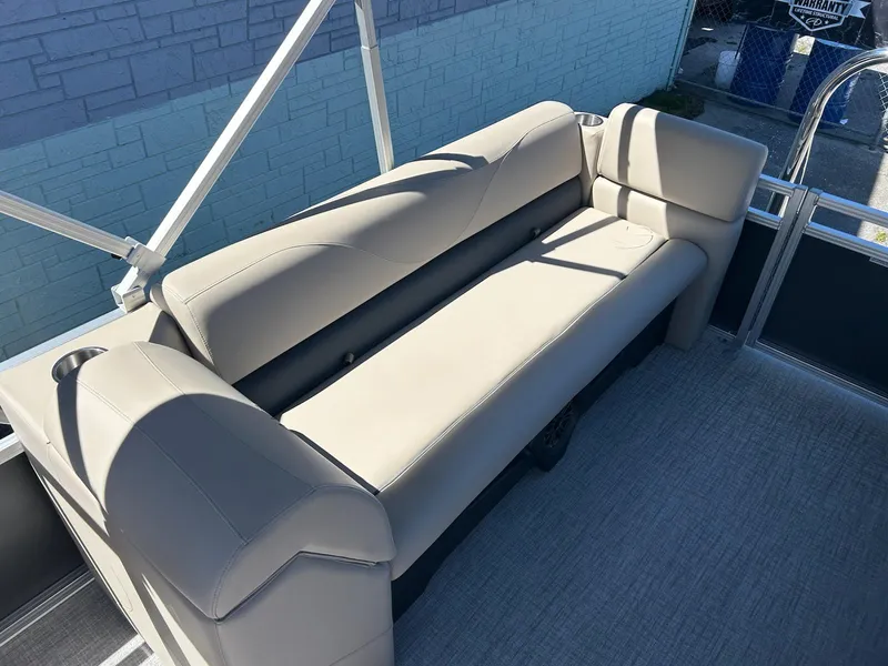 Slide: The Image of 2025 Avalon 2380 VLS Quad Lounger with beige seating on a pontoon boat. - 9