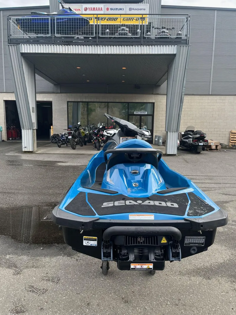 Slide: The Image of 2018 Sea-Doo GTI SE 155 jet ski parked outside dealership. - 5