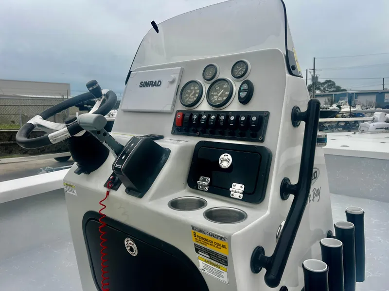 Slide: The Image of 2015 Blazer Bay 2220 GTS boat console with gauges and controls. - 6
