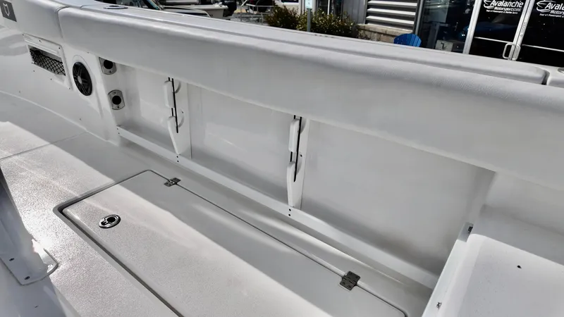 Slide: The Image of Interior view of 2025 Sea Fox 268 Commander boat, showcasing storage compartments and seating. - 14