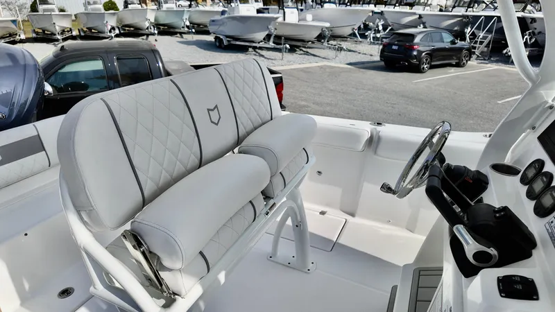 Slide: The Image of 2025 Sea Fox 268 Commander boat interior with plush seating and modern controls. - 8