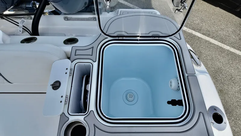 Slide: The Image of 2025 Sea Fox 268 Commander boat interior with open storage compartment. - 17