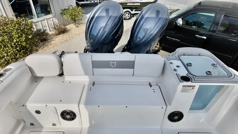 Slide: The Image of 2025 Sea Fox 268 Commander boat interior with dual engines and seating area. - 7