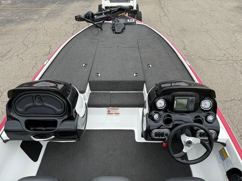 Slide: The Image of 2015 Nitro Z Series Z-7 boat interior with dual consoles and steering wheel. - 7