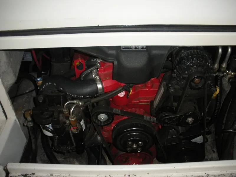 Slide: The Image of Engine compartment of a 2004 Seaswirl Striper 2101 Walkaround I/O boat. - 14