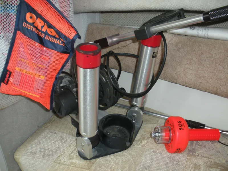 Slide: The Image of Safety equipment on a 2004 Seaswirl Striper 2101 Walkaround I/O boat, including distress signals. - 4