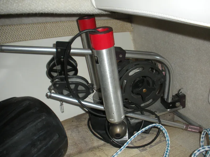 Slide: The Image of Boat equipment inside 2004 Seaswirl Striper 2101 Walkaround I/O, featuring rods and cables. - 5