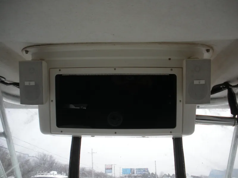 Slide: The Image of 2004 Seaswirl Striper 2101 Walkaround I/O boat interior with mounted speakers. - 6