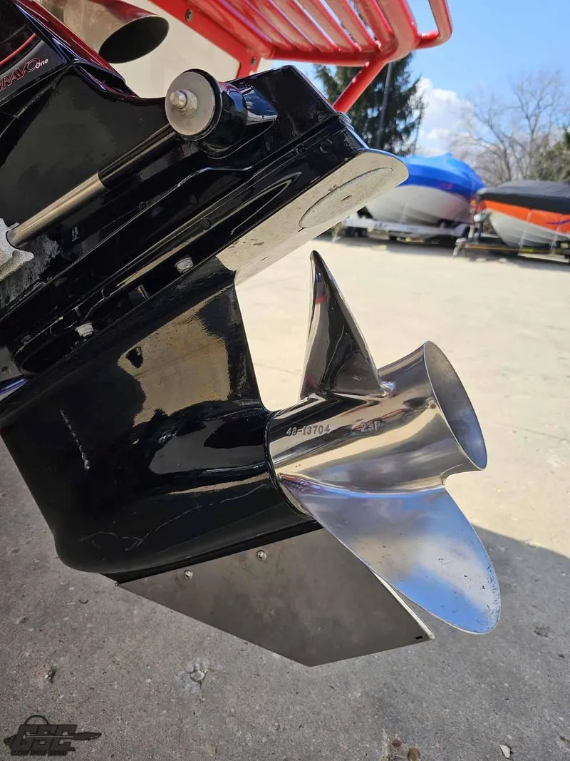 Slide: The Image of 2008 Baja 23 Outlaw boat propeller, shiny stainless steel, close-up view. - 41
