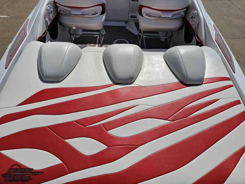 Slide: The Image of 2008 Baja 23 Outlaw boat interior with red and white seating design. - 46