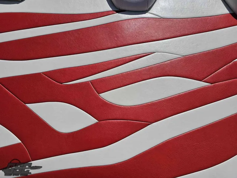 Slide: The Image of Red and white leather upholstery design on 2008 Baja 23 Outlaw boat interior. - 49