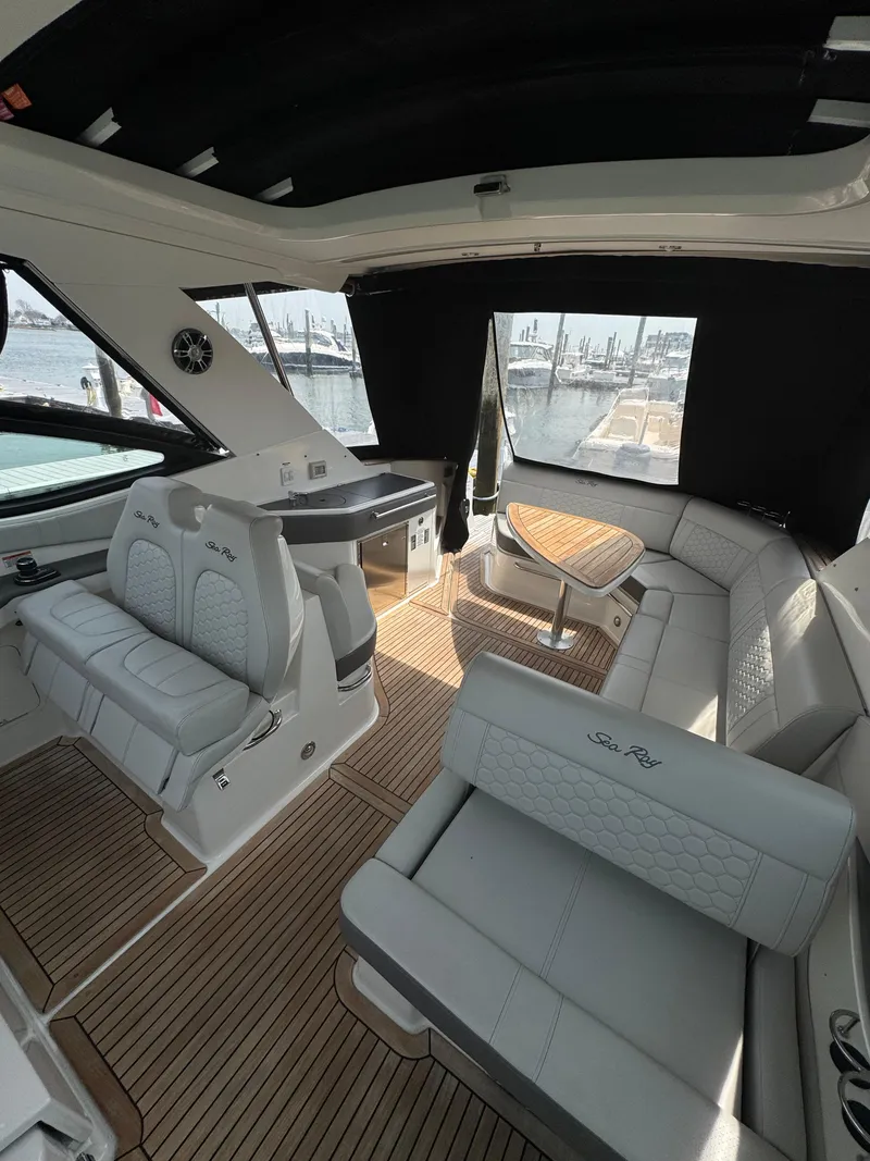 Slide: The Image of 2021 Sea Ray Sundancer 320 OB interior with luxurious seating and elegant design. - 34