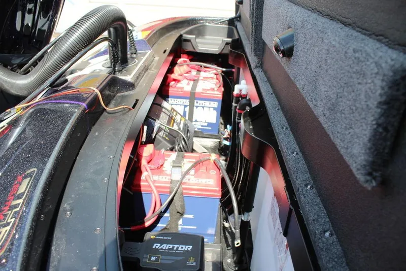 Slide: The Image of 2025 Skeeter FXR21L boat battery compartment with Raptor power system. - 16