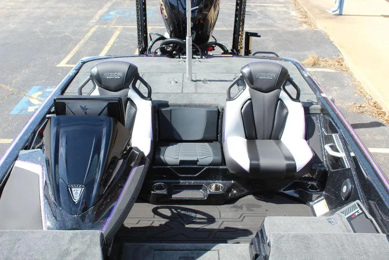 Slide: The Image of 2025 Skeeter FXR21L boat interior with dual seats and sleek design. - 21