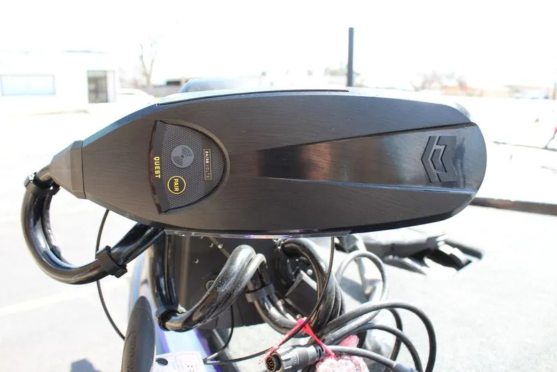 Slide: The Image of 2025 Skeeter FXR21L boat control panel with steering and wiring. - 22