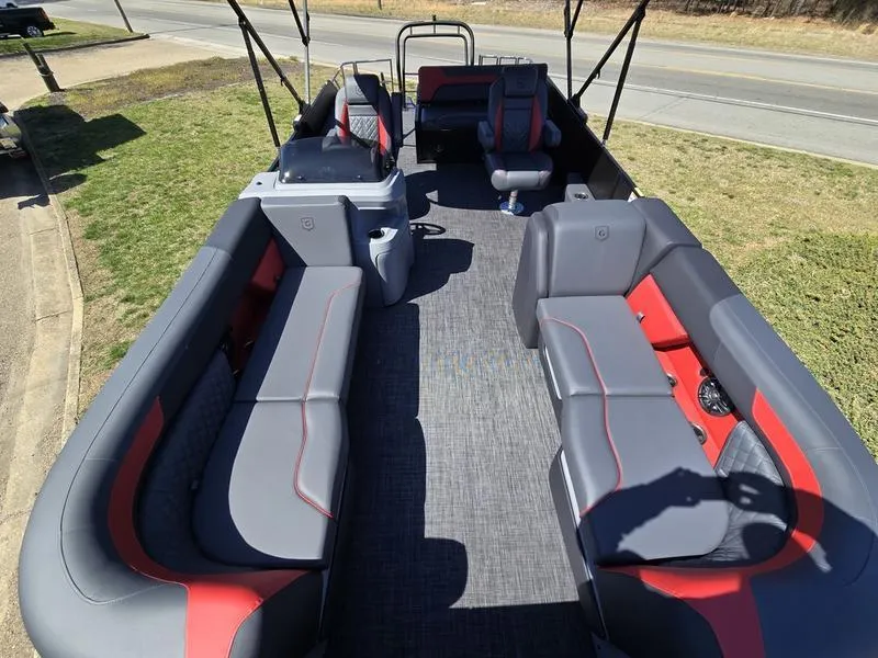Slide: The Image of 2025 Godfrey Sweetwater 2286 SFLC pontoon boat interior with gray and red seating. - 12