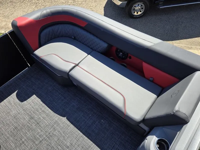 Slide: The Image of 2025 Godfrey Sweetwater 2286 SFLC boat interior with gray and red seating. - 13