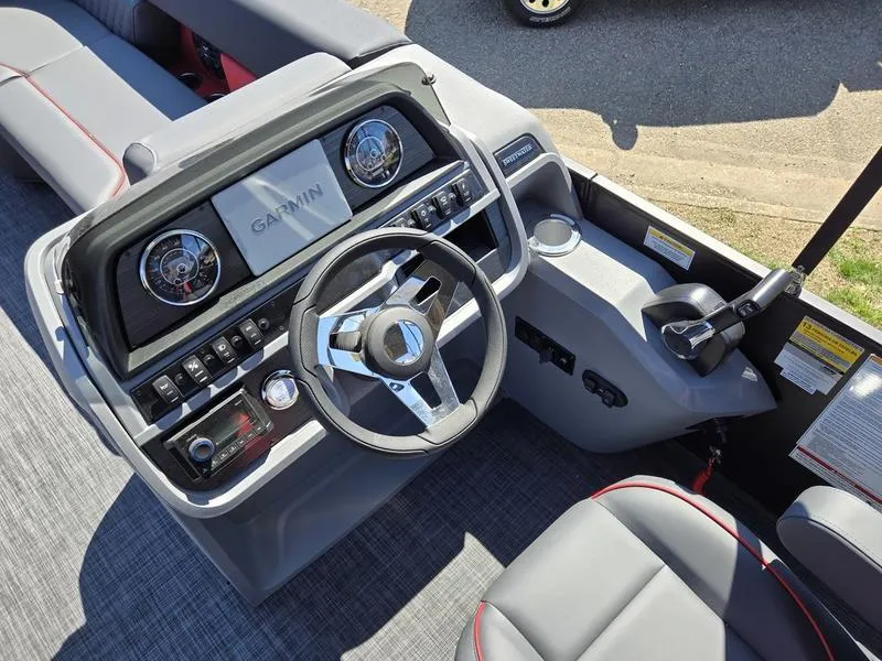 Slide: The Image of Cockpit of 2025 Godfrey Sweetwater 2286 SFLC boat with Garmin navigation system. - 17