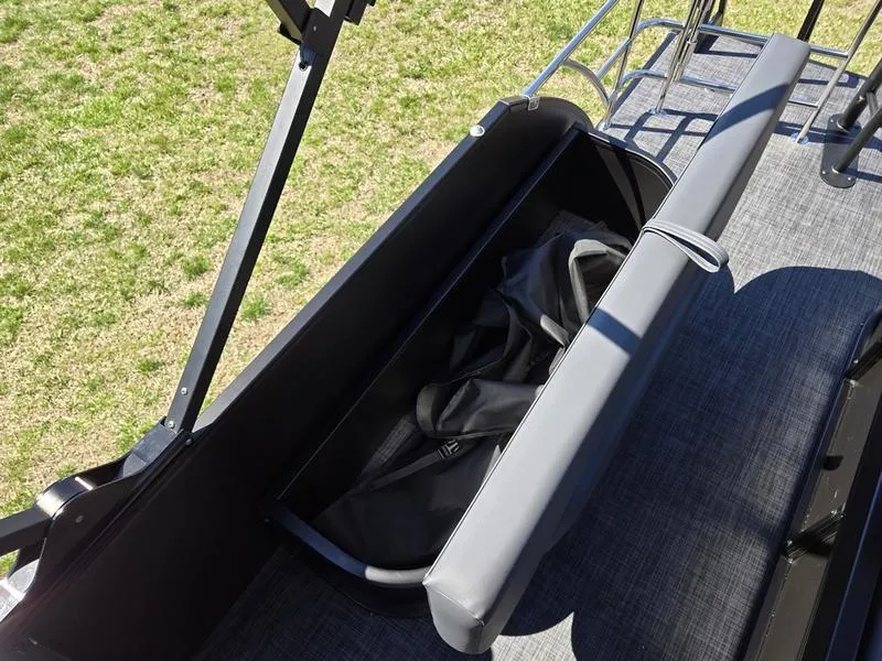 Slide: The Image of Interior view of 2025 Godfrey Sweetwater 2286 SFLC boat with open storage compartment. - 8