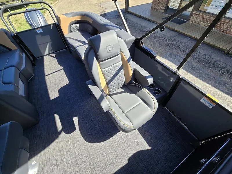 Slide: The Image of Luxurious interior of 2025 Godfrey Sweetwater 2286 SB pontoon boat with plush seating. - 11