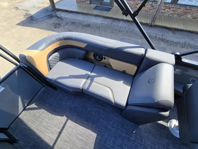 Slide: The Image of Luxurious seating on 2025 Godfrey Sweetwater 2286 SB pontoon boat, featuring sleek design and comfort. - 18
