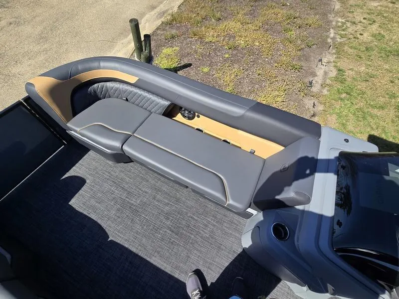 Slide: The Image of 2025 Godfrey Sweetwater 2286 SB boat interior with sleek seating and modern design. - 9