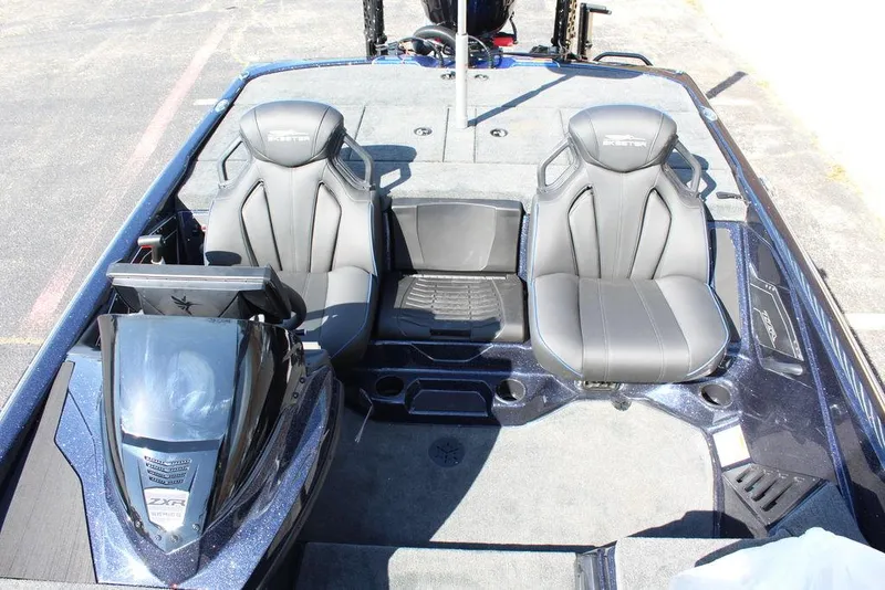 Slide: The Image of 2025 Skeeter ZXR20 boat interior with dual seats and console. - 15