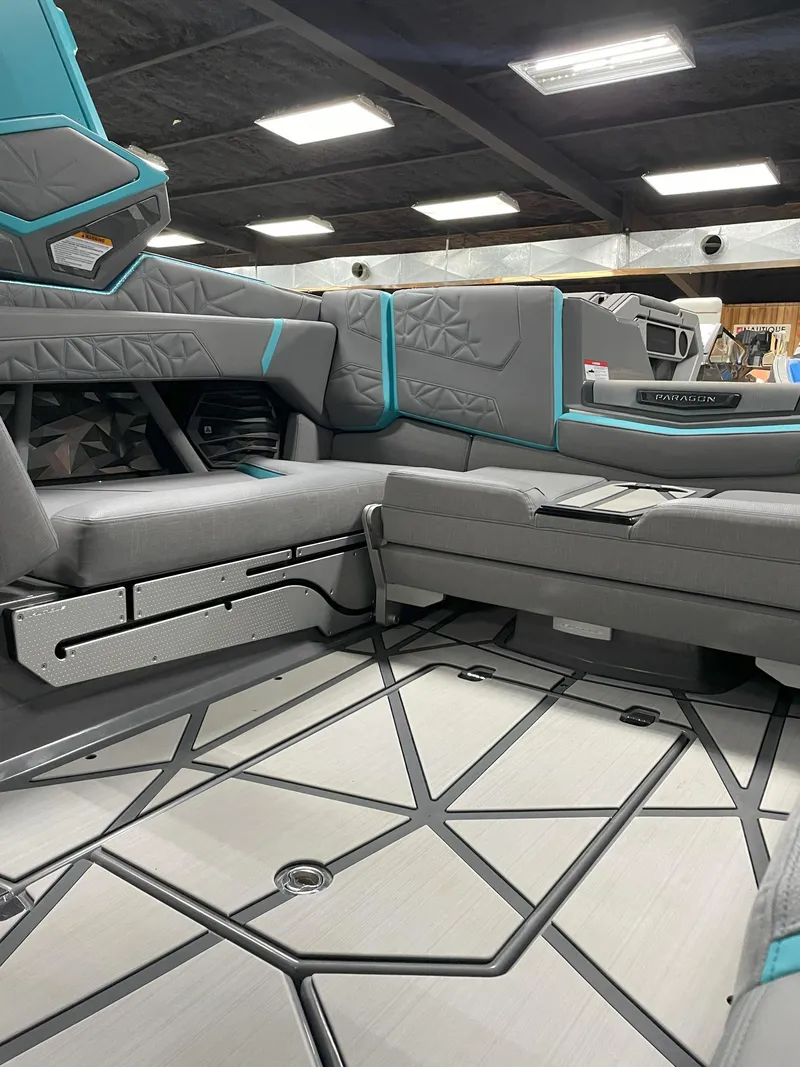 Slide: The Image of 2024 Nautique Super Air Nautique G23 Paragon interior with modern seating and sleek design. - 15