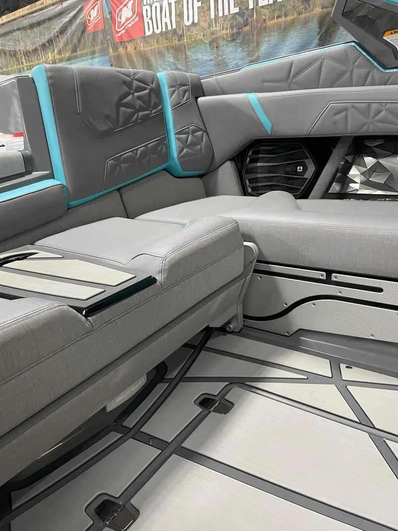 Slide: The Image of 2024 Nautique Super Air Nautique G23 Paragon interior with modern seating and sleek design. - 16