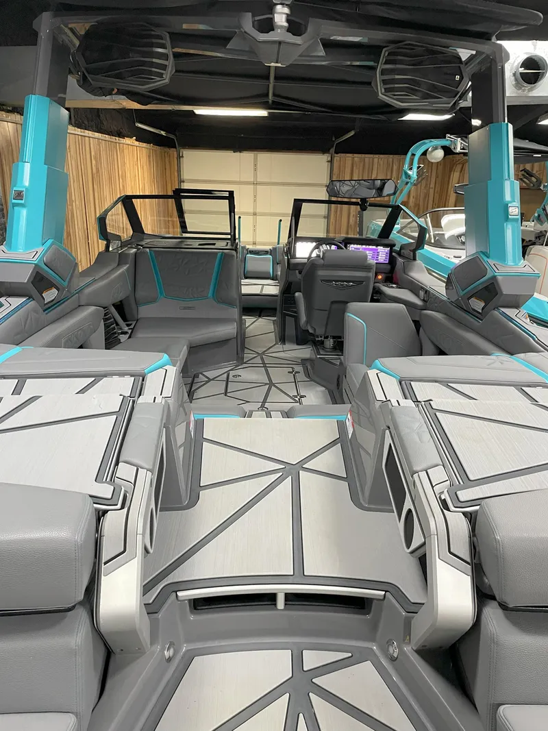 Slide: The Image of 2024 Nautique Super Air Nautique G23 Paragon interior with modern design and seating. - 18