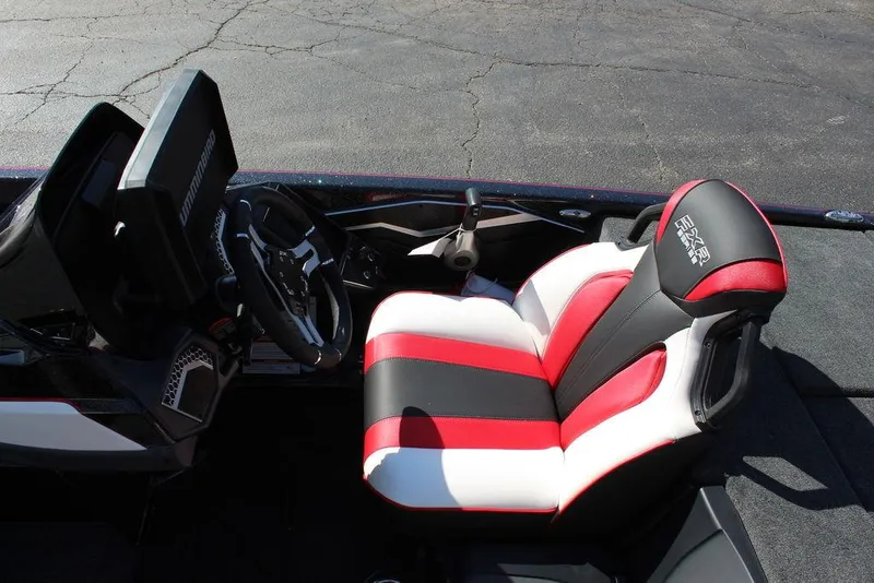 Slide: The Image of 2025 Skeeter FXR21L boat interior with stylish red, black, and white seating. - 17